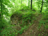 Hrad Chudý hrádek - zbytky zdiva hradby na severozápadě Hrad Chudý hrádek - zbytky zdiva hradby na severozápadě